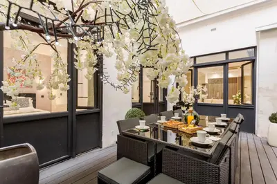 Coin salon dans l'établissement APT 10P 160m2 WITH TERACe