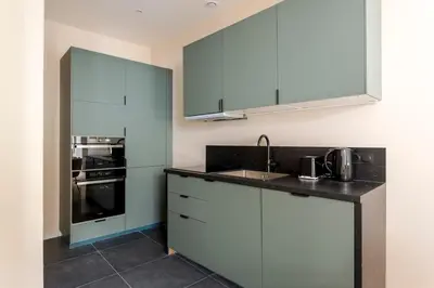 Cuisine ou kitchenette dans l'établissement APT 10P 160m2 WITH TERACe