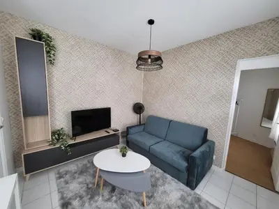 Coin salon dans l'établissement Appartement T2 spacieux de 30m2, idéal proche Paris