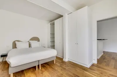 Un ou plusieurs lits dans un hébergement de l'établissement Pick A Flat's Apartment in Saint Germain - Rue de Buci