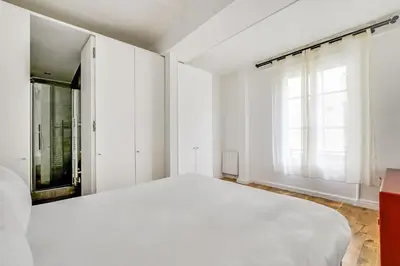 Un ou plusieurs lits dans un hébergement de l'établissement Pick A Flat's Apartment in Saint Germain - Rue de Buci