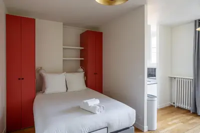 Un ou plusieurs lits dans un hébergement de l'établissement The Paris 15 Place