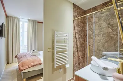 Salle de bains dans l'établissement Apartment 3 bedrooms Center of Paris by Studio Prestige