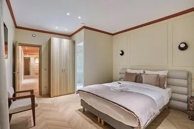 Un ou plusieurs lits dans un hébergement de l'établissement Apartment 3 bedrooms Center of Paris by Studio Prestige
