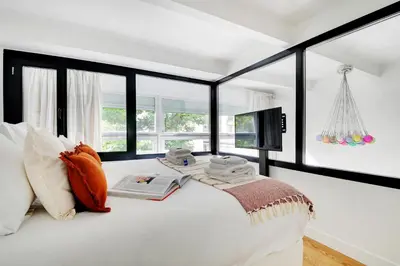 Un ou plusieurs lits dans un hébergement de l'établissement Amazing Loft 2BR - Eiffel Tower