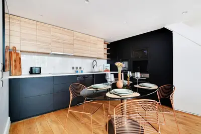 Cuisine ou kitchenette dans l'établissement Amazing Loft 2BR - Eiffel Tower