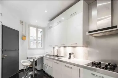 Cuisine ou kitchenette dans l'établissement Appartement fabuleux - 16eme