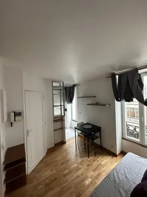 Un ou plusieurs lits dans un hébergement de l'établissement Central Studio Paris 1C
