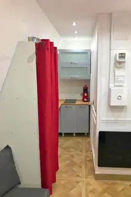 Cuisine ou kitchenette dans l'établissement Pretty Central flat in Paris