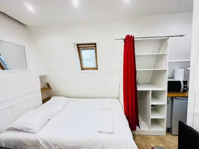 Un ou plusieurs lits dans un hébergement de l'établissement Pretty Central flat in Paris