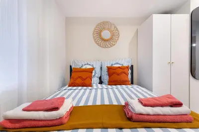 Un ou plusieurs lits dans un hébergement de l'établissement STUDIO Boulogne Roland Garros