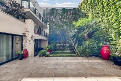 Jardin de l'établissement Appartement d'exception - Proche Tour Eiffel