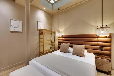 Un ou plusieurs lits dans un hébergement de l'établissement Elegant Home - 5BD-12P - Heart of 'Le Marais'