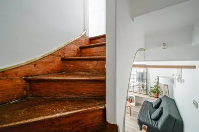 Coin salon dans l'établissement Appartement idéal famille, en duplex et au calme, au pied du métro 