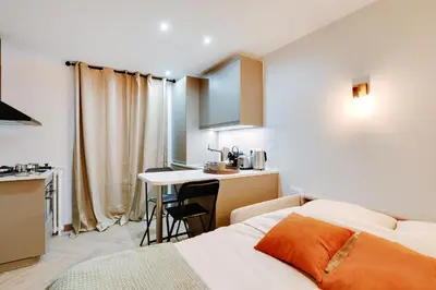 Un ou plusieurs lits dans un hébergement de l'établissement Appartement 2 personnes - Tour Eiffel