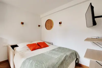 Un ou plusieurs lits dans un hébergement de l'établissement Appartement 2 personnes - Tour Eiffel