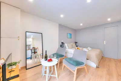 Coin salon dans l'établissement 388 Suite Trousseau - Superbe Appartement à Paris