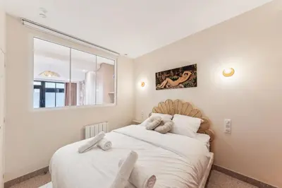 Un ou plusieurs lits dans un hébergement de l'établissement Appartement élégant -Roquette -6pers