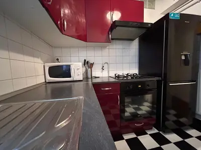 Cuisine ou kitchenette dans l'établissement Duplex Paris 18ème proche Montmartre