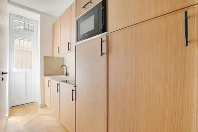Cuisine ou kitchenette dans l'établissement Belleville republique
