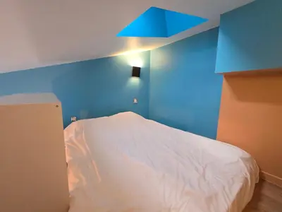 Un ou plusieurs lits dans un hébergement de l'établissement 4D- Studio neuf/cosy proche Paris/Parc des expositions