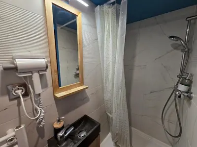Salle de bains dans l'établissement 4D- Studio neuf/cosy proche Paris/Parc des expositions