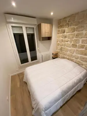 Un ou plusieurs lits dans un hébergement de l'établissement Appartement neuf à louer, Paris Sacré Cœur