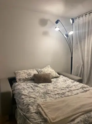 Un ou plusieurs lits dans un hébergement de l'établissement Studio neuf cozy avec balcon, 11e arr Voltaire, proche Bastille