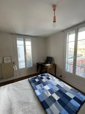 Un ou plusieurs lits dans un hébergement de l'établissement Parisian Nest - Comfort appartement