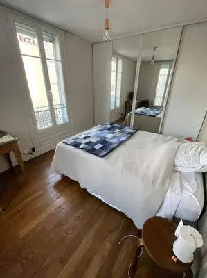Un ou plusieurs lits dans un hébergement de l'établissement Parisian Nest - Comfort appartement