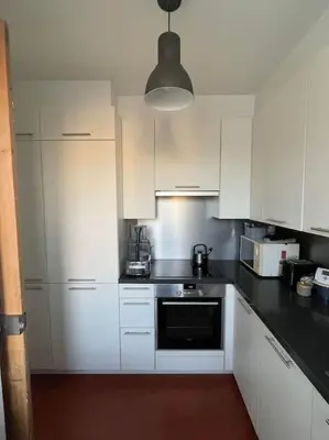 Cuisine ou kitchenette dans l'établissement Parisian Nest - Comfort appartement