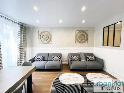 Coin salon dans l'établissement 23 - Charming Parisian Flat in Paris