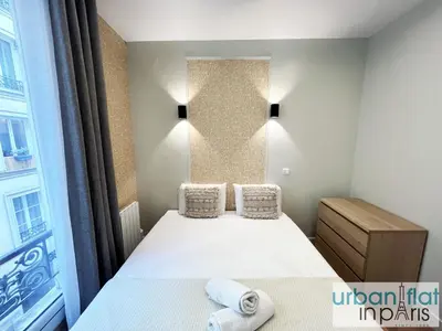 Un ou plusieurs lits dans un hébergement de l'établissement 23 - Charming Parisian Flat in Paris