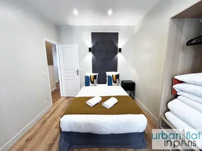 Un ou plusieurs lits dans un hébergement de l'établissement 23 - Charming Parisian Flat in Paris