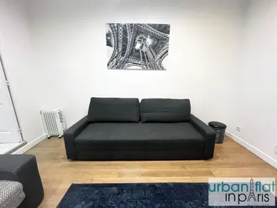 Coin salon dans l'établissement Urban Flat 52 - Charming 2 BDR Flat in Center of Paris
