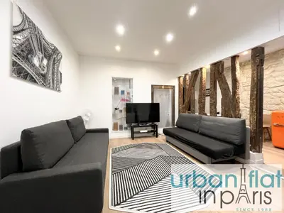 Coin salon dans l'établissement Urban Flat 52 - Charming 2 BDR Flat in Center of Paris