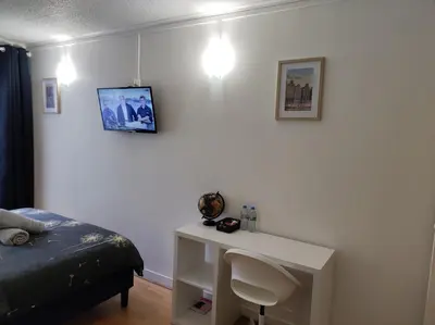 Un ou plusieurs lits dans un hébergement de l'établissement Trocadéro suite Paris 16ieme - with balcony