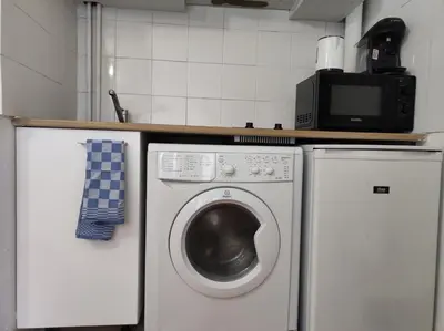 Cuisine ou kitchenette dans l'établissement Trocadéro suite Paris 16ieme - with balcony