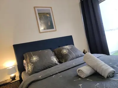 Un ou plusieurs lits dans un hébergement de l'établissement Trocadéro suite Paris 16ieme - with balcony