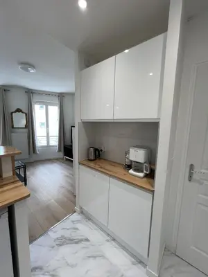 Cuisine ou kitchenette dans l'établissement Stylish apartment in Paris