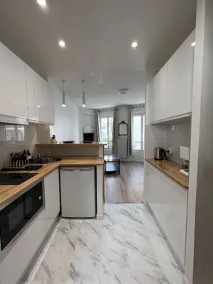 Cuisine ou kitchenette dans l'établissement Stylish apartment in Paris