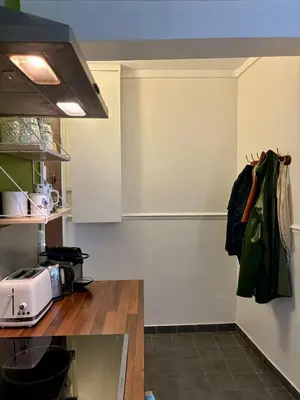 Cuisine ou kitchenette dans l'établissement Cosy appartement Montmartre