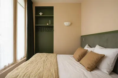 Un ou plusieurs lits dans un hébergement de l'établissement Sublime appartement luxe Paris Haut-Marais AC
