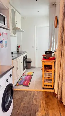 Cuisine ou kitchenette dans l'établissement APPARTEMENT*GARE DE L'EST-PARIS 10