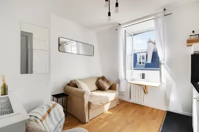 Télévision ou salle de divertissement dans l'établissement Bosquet - Rue Cler
