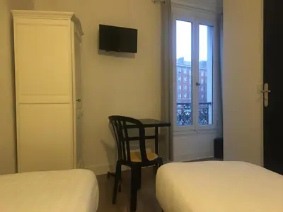 Un ou plusieurs lits dans un hébergement de l'établissement le paris saint ouen