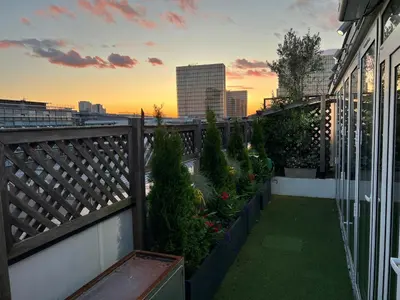 Jardin de l'établissement Duplex Terrasse au soleil