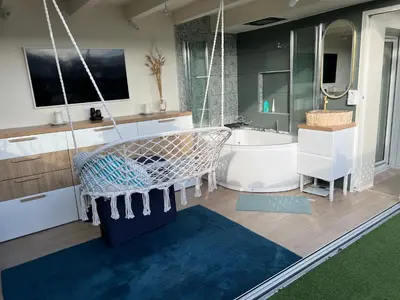 Coin salon dans l'établissement Duplex Terrasse au soleil