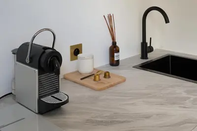 Cuisine ou kitchenette dans l'établissement Studio Épinettes