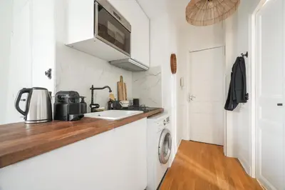Cuisine ou kitchenette dans l'établissement Luxe appartement Parisien